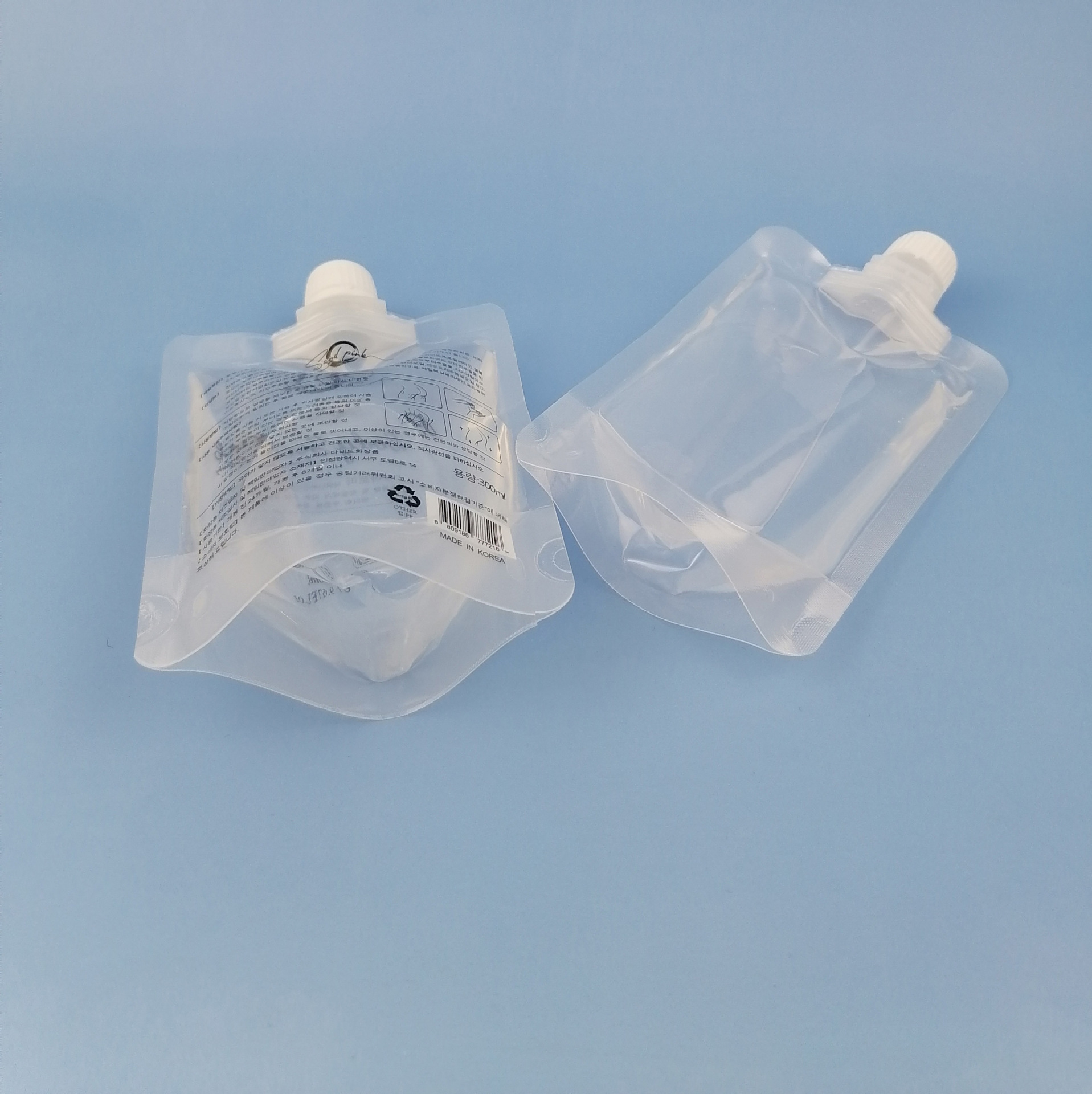 Custom Stand-Up Spout Pouches 100ml–300ml for Skincare & Body Care Travel Packs